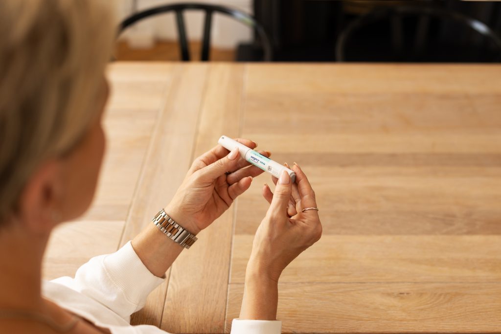 Over the shoulder of woman