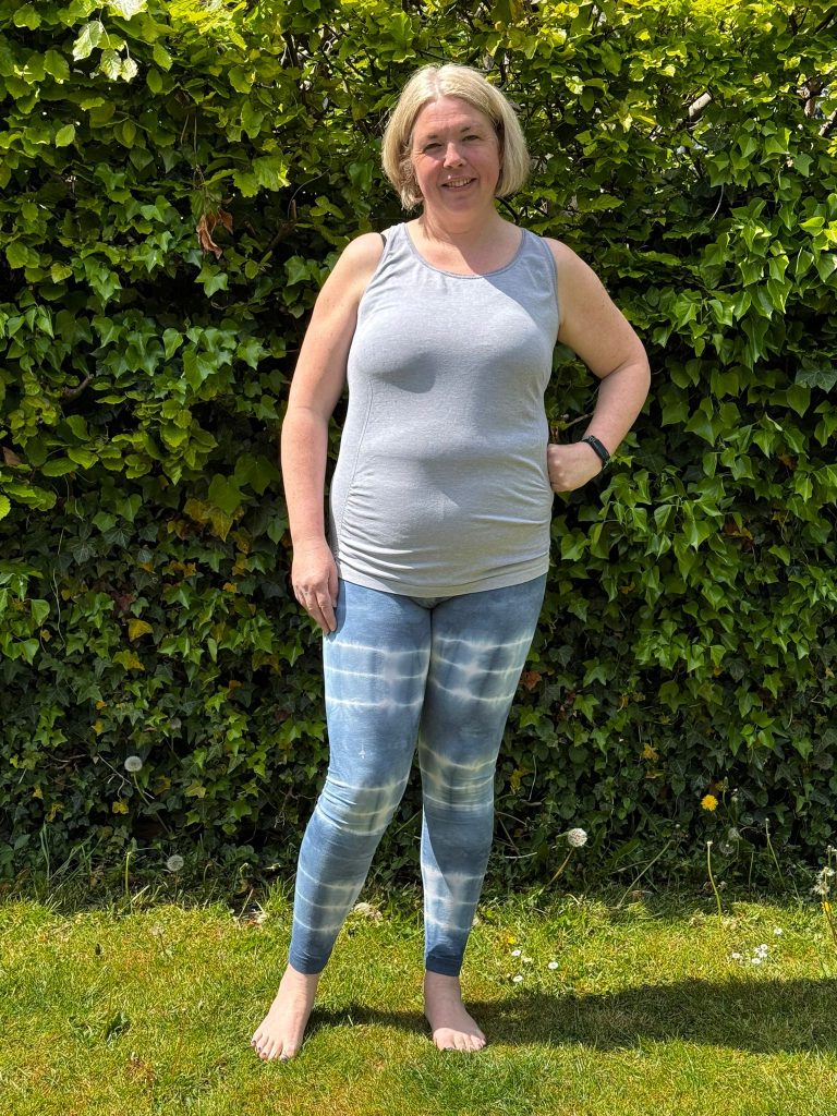 Women stood in field in gym attire