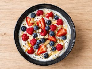 Greek yogurt bowl with berries chia seeds almonds